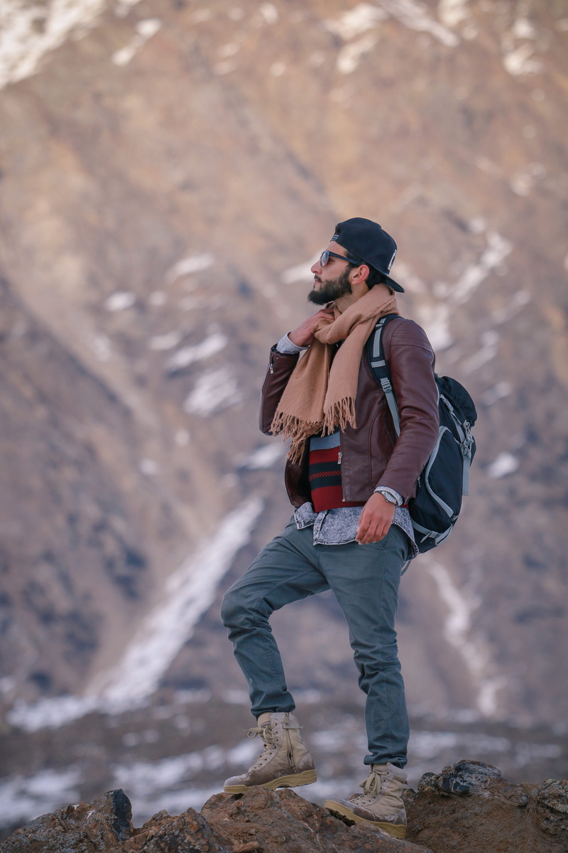 outdoors, attractive, young adult, leisure activity, full length, lifestyles, one person, technology, photography themes, young, snow, camera - photographic equipment