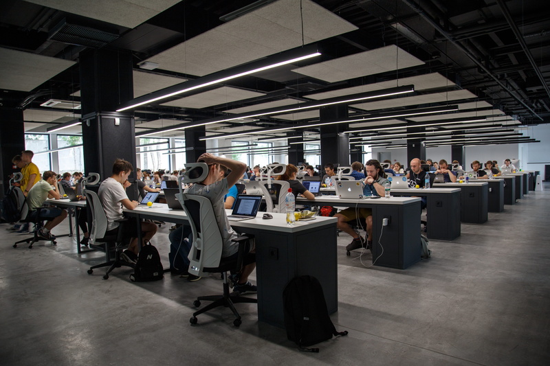 sitting, concentration, works, office, architecture, gray, front, adult, using, swivel chair, real people, business, group of people, built structure, seat