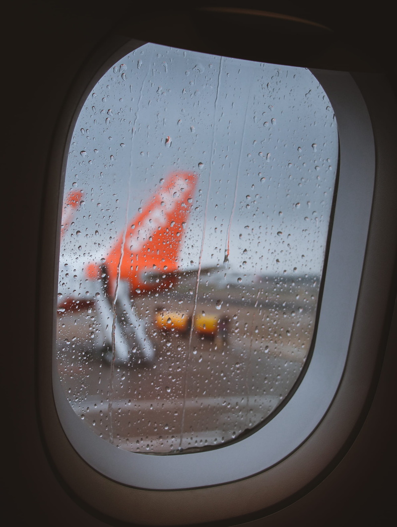 day, strorm, vehicle interior, light, moody, land vehicle, flare, hublot, aeroport, rainy season, water, rainy, no people, transportation, wet, nature