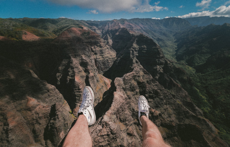 rock, landscape, day, cliff, sitting, sky, leisure activity, high Angle View, Float, travel, outdoors, lifestyles, real people, mountain range, human body part