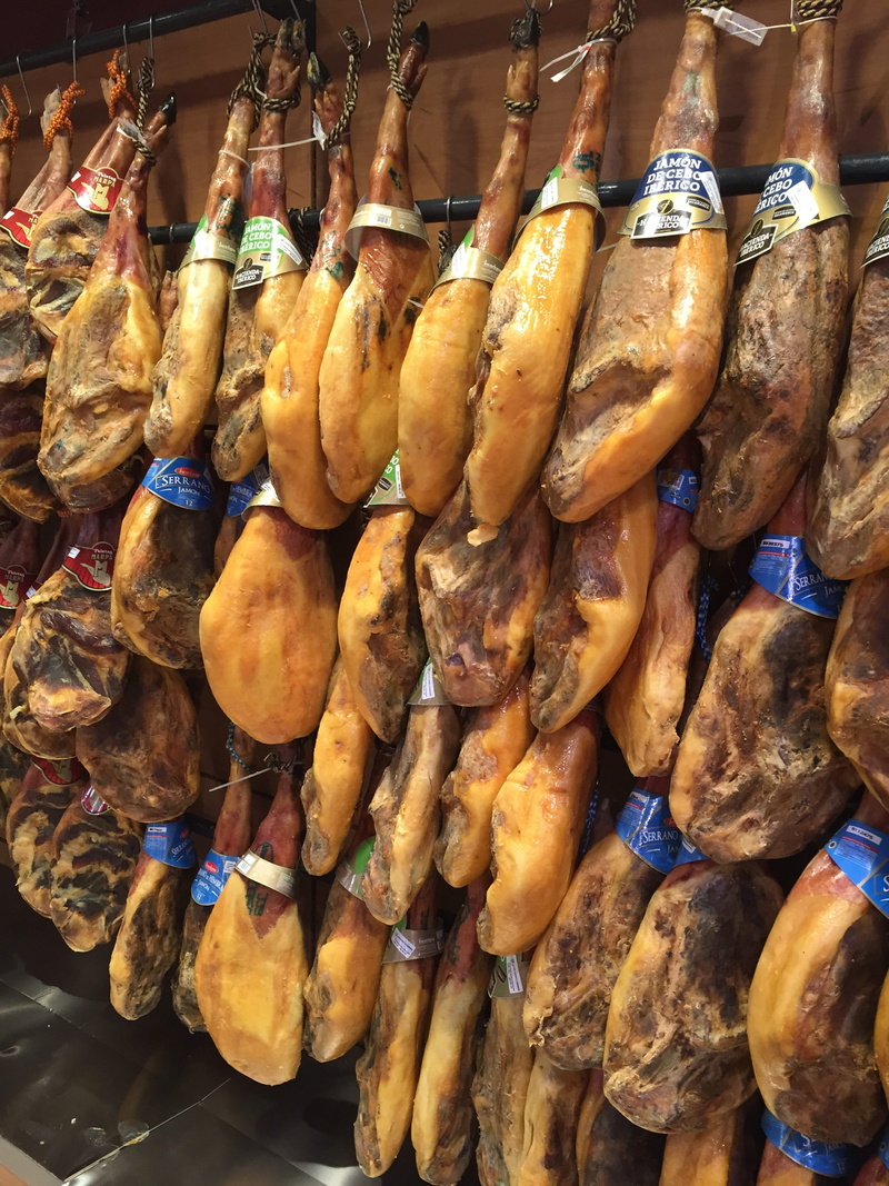 hams, food, hangs, business, brown, freshness, retail, spain, wall, food and drink, market, choice, for sale, hanging, legs, abundance, tapas, market stall