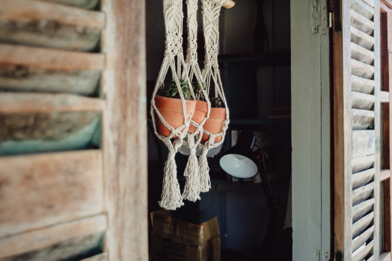 real people, human body part, entrance, 4K, wood - material, human limb, human leg, pots, architecture, hanging, lifestyles, outdoors, decor, pot plants