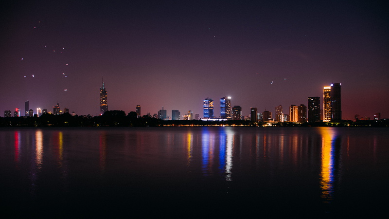 china, tall - high, no people, downtown district, building exterior, city, tower, nightlife, building, cityscape, office building exterior, modern, water