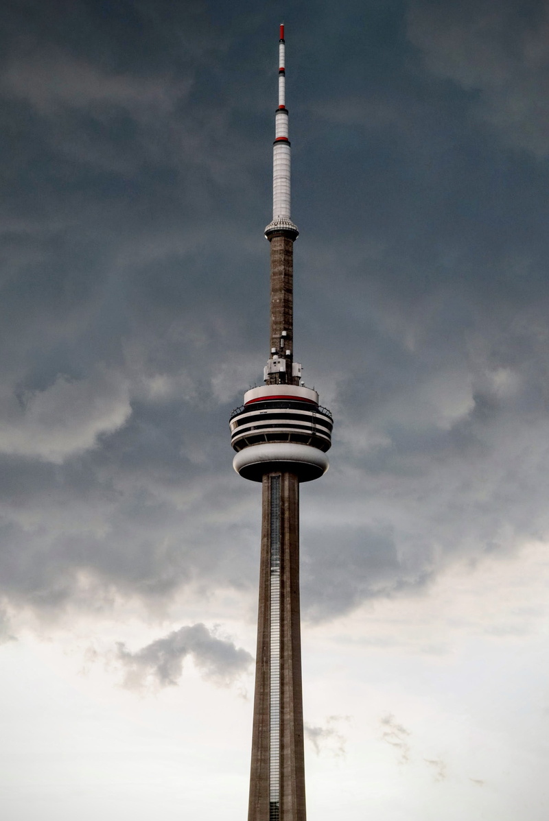 spire, technology, tall - high, nature, clouds, travel, outdoors, sky, building, global communications, cloud - sky, city, building exterior, tower, skyscraper