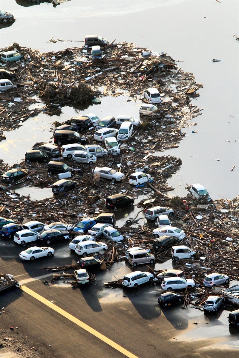 fishing industry, mode of transportation, transportation, outdoors, environment, high angle view, land vehicle, car, earthquakes, city, day, garbage, water