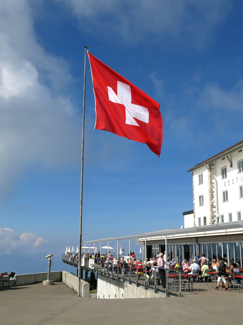 hotel, day, men, sky, real people, city, group of people, cloud - sky, women, view, rigi, red, flag, wind, lifestyles, swiss flag, alpine, patriotism, holiday