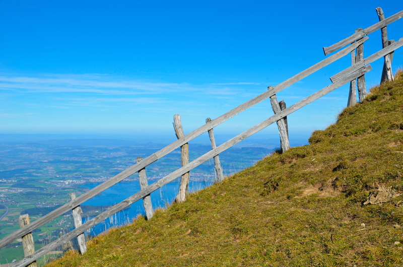 environment, alp, day, abyss, no people, tranquil scene, alm, connection, blue, mountain, nature, barrier, sky, steep, slope, beauty in nature, water, wood fence