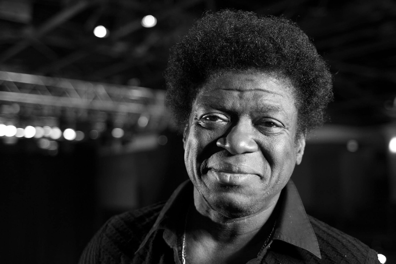 men, African, Charles Bradley, monochrome, leisure activity, males, night, front view, looking at camera, close-up, focus on foreground, looking at viewer
