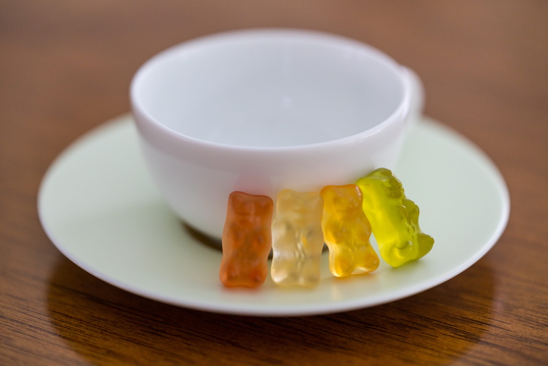 group of objects, table, colour, indulgence, healthy eating, crockery, four, food and drink, food, gummy, yellow, coffee, plate, wood - material, wellbeing