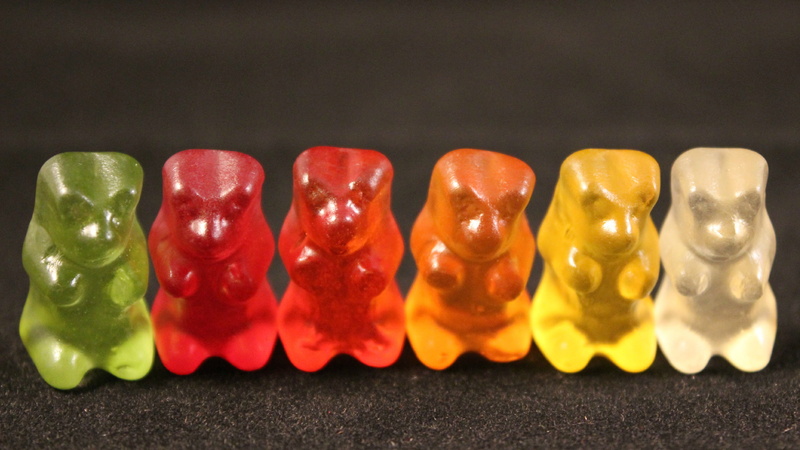 gummibärchen, delicious, focus, assorted, photography, multi colored, arrangement, variation, 2K, in a row, red, studio shot, shiny, colored background