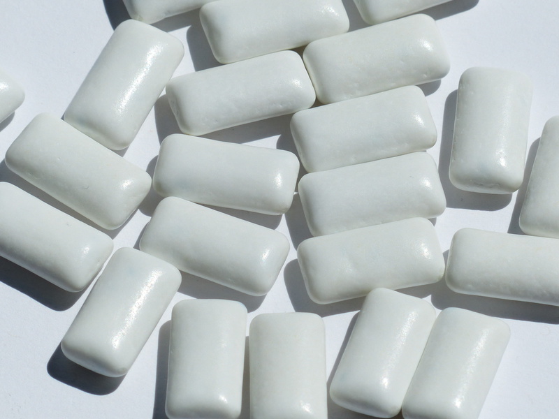 no people, pill, pile, close-up, coated, healthcare and medicine, in a row, white color, pattern, white, food and drink, still life, capsule, dose, medicine