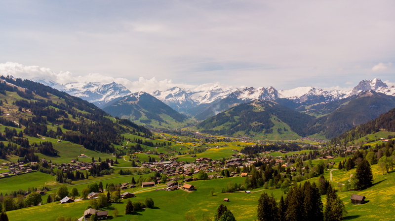 idyllic, mountain range, tranquil scene, switzerland, sky, green color, cloud - sky, rural scene, snowcapped mountain, grass, mountain peak, valley, tranquility