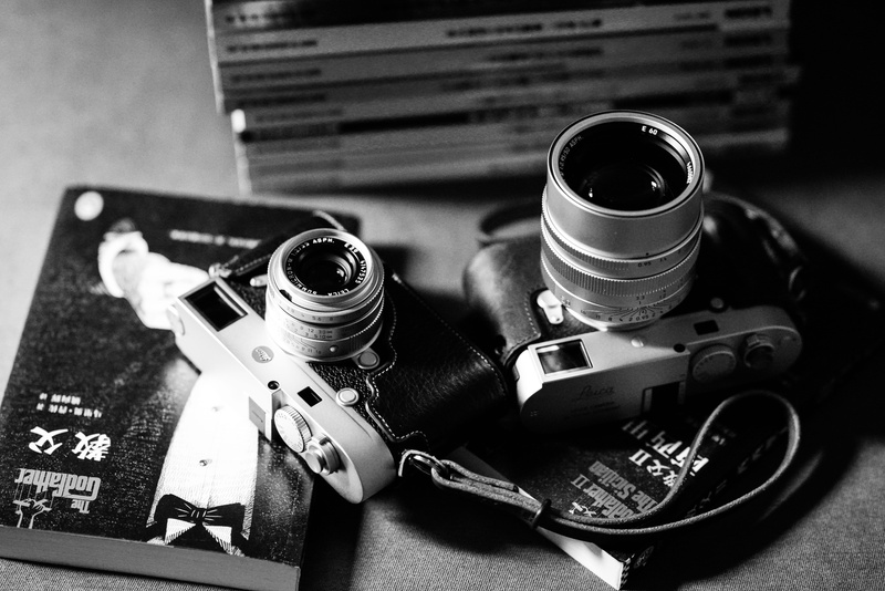 focus on foreground, still life, aggression, case, no people, home video camera, crime, table, milc, retro, violence, black and white, gun, read, camera strap