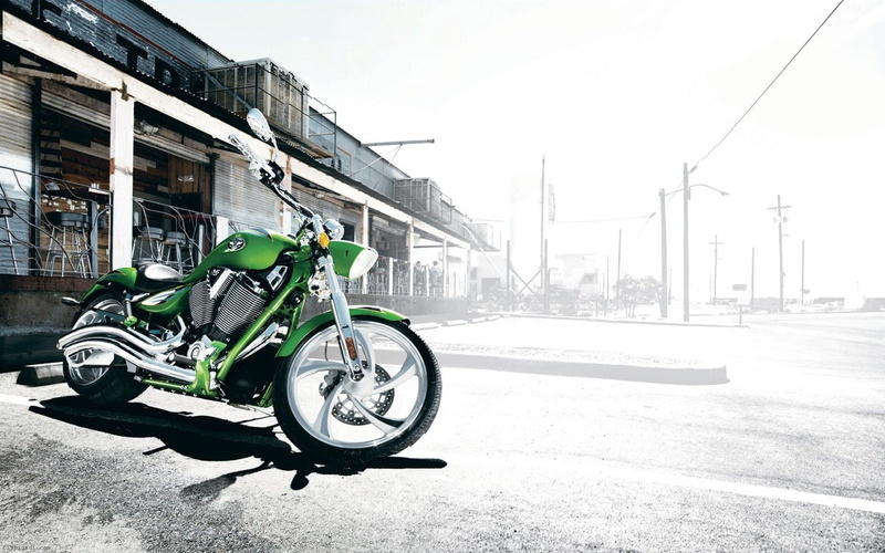 mode of transportation, stationary, winter, building exterior, transportation, outdoors, bicycle, land vehicle, sunlight, building, sky, Victory, Motorcycles