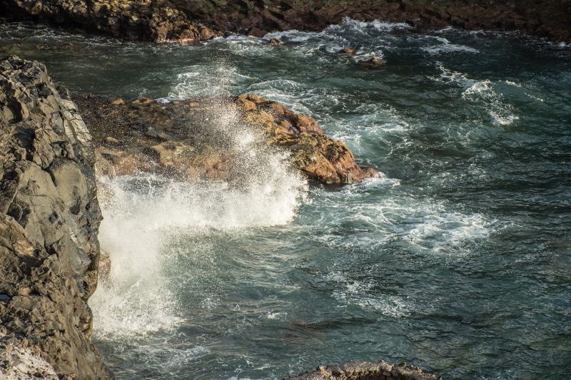 beauty in nature, sport, sea, waterfront, power, waves, scenics - nature, rock, savage, high angle view, rocks, solid, nature, power in nature, no people