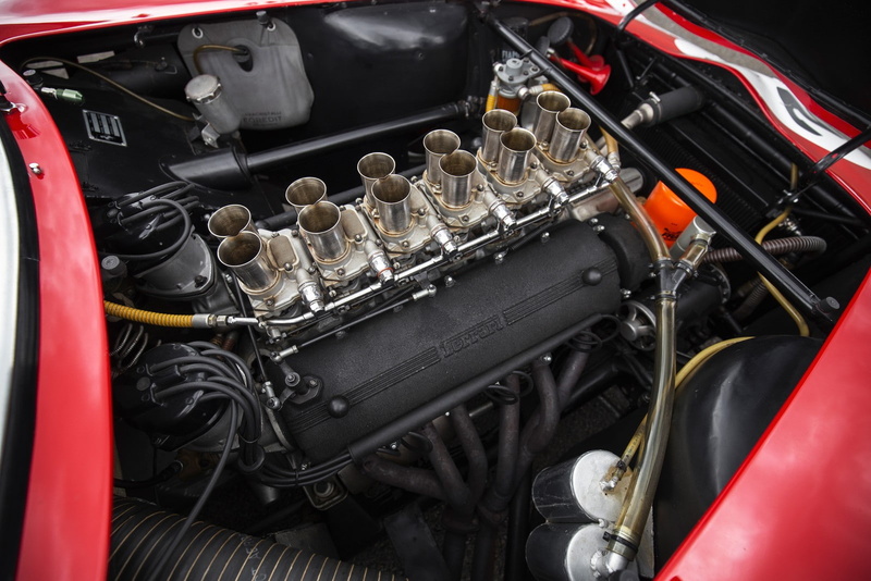 air vehicle, motor vehicle, indoors, close-up, metal, 720P, red, car, land vehicle, airplane, equipment, 1962, black color, vehicle part, no people, ferrari