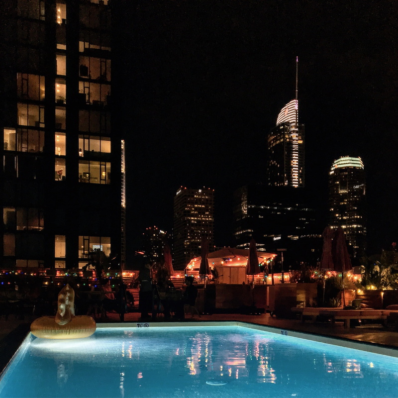 sky, swimming pool, cityscape, rooftop, moments, reflection, outdoors, nighlife, pool, skyscraper, city lights, downtown, bar, buildings at night, no people