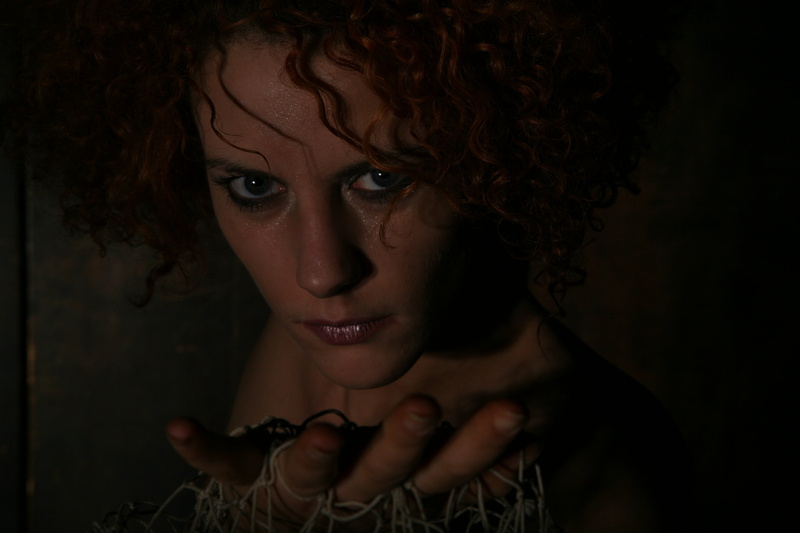 portrait, adult, clown, beautiful woman, people, psychopath, brown hair, crazy, indoors, person, dark, close-up, body part, studio shot, females, front view