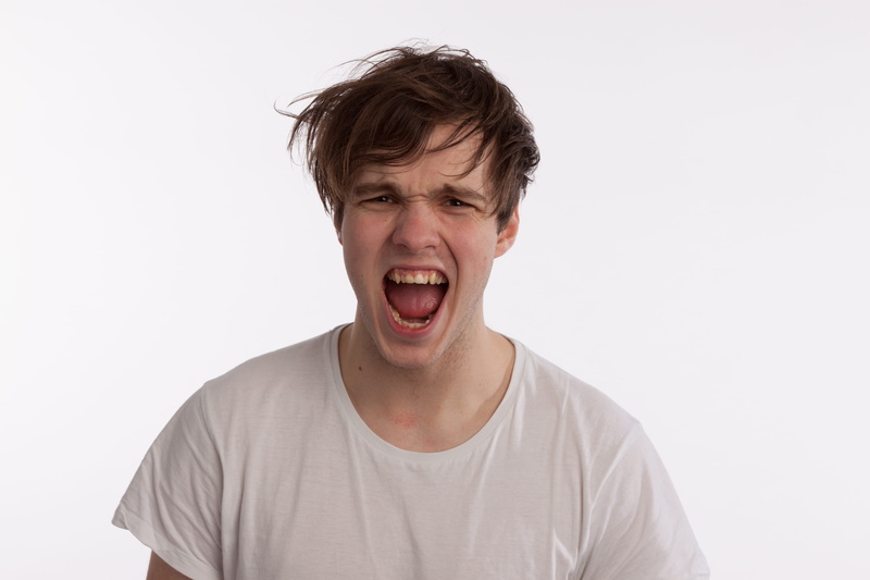 one person, face, mess, headshot, adult, hair, indoors, person, male, mouth, young adult, white, crazy, anger, nose, casual clothing, men, irritation, aggression