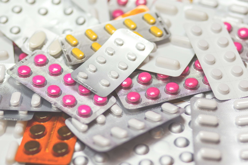 white color, close-up, variation, healthcare and medicine, indoors, pill, abundance, blister pack, high angle view, treatment, pills, choice, excess, selective focus