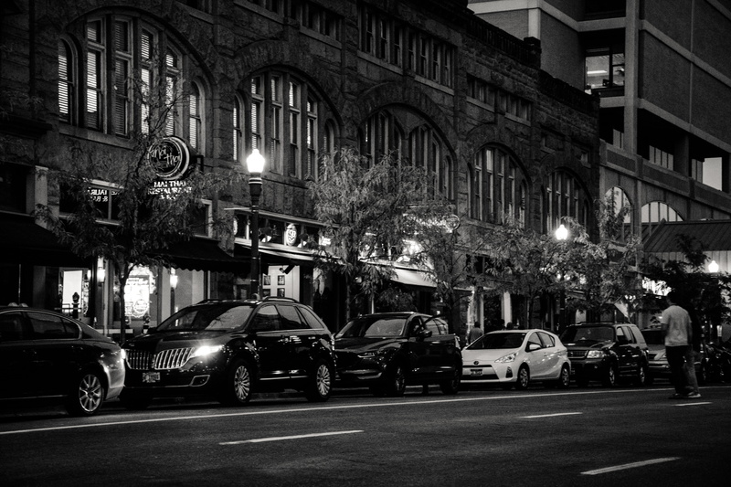 night, travel, 5K, grayscale, mode of transportation, people, pavement, street light, cars, no people, parked, architecture, land vehicle, motion, illuminated