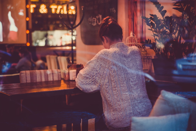 cardigan, stool, happy hour, lifestyles, food and drink, one person, furniture, vehicle, portrait, face, casual clothing, bar counter, human, pub, women