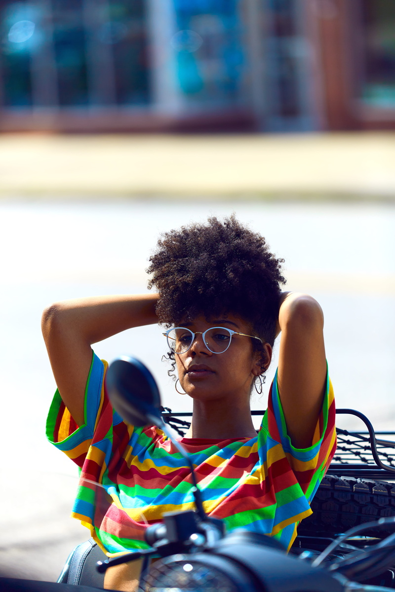 focus on foreground, outdoors, transportation, united states, glasses, afro hairstyle, back, one person, headshot, person, childhood, head, front view