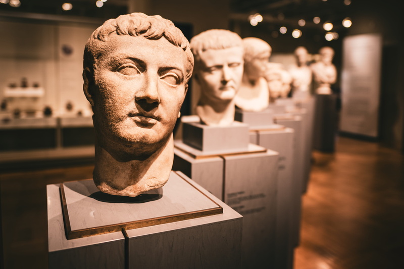 table, arts culture and entertainment, close-up, indoors, human representation, creativity, focus on foreground, museum, statue, head, ancient, art and craft