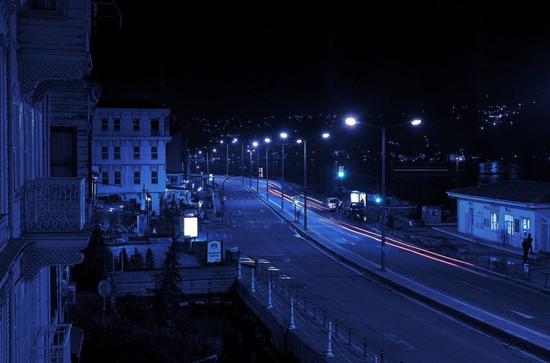 city, street light, 5K, high angle view, lighting equipment, cars, building exterior, illuminated, track, railroad track, road, blue, traffic, cityscape