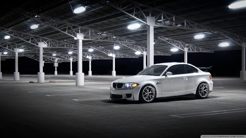 motor vehicle, night, parking garage, luxury, garage, gray, architecture, land vehicle, built structure, roof, tire, wealth, shiny, mode of transportation