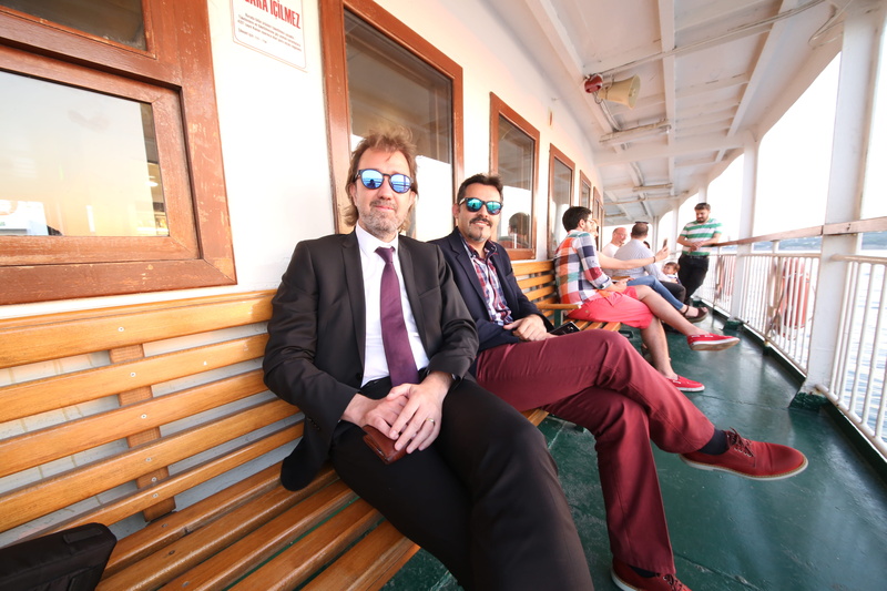 men, business, indoors, sunglasses, seat, harem, three quarter length, sitting, adult, 5K, mid adult, group of people, males, suit, business person, window