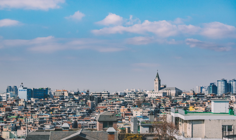 spire, cloud - sky, city life, office building exterior, building exterior, tall - high, urban, crowded, tower, settlement, residential district, outdoors