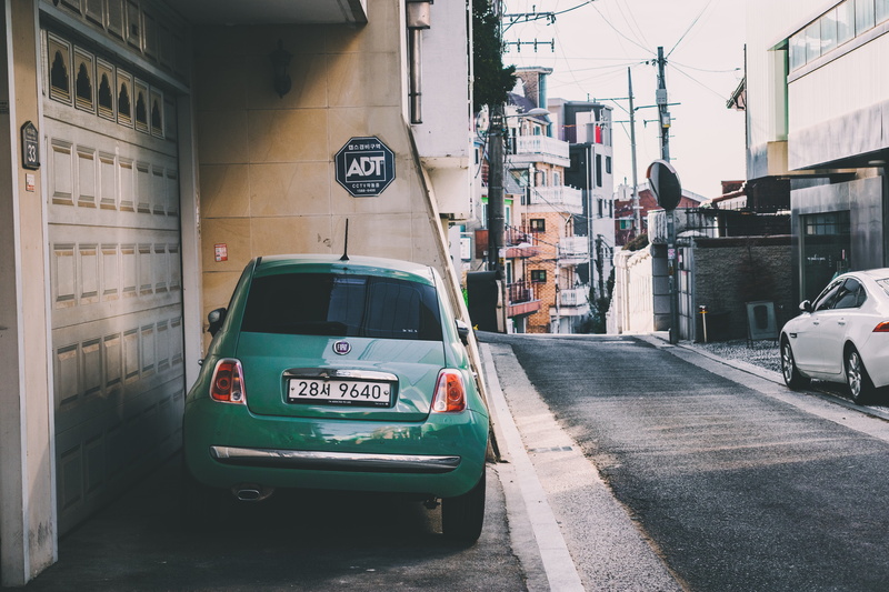 sports car, machine, building exterior, van, text, building, road, south korea, spoke, coupe, city, green, tire, itaewon 2(i)-dong, street, mode of transportation