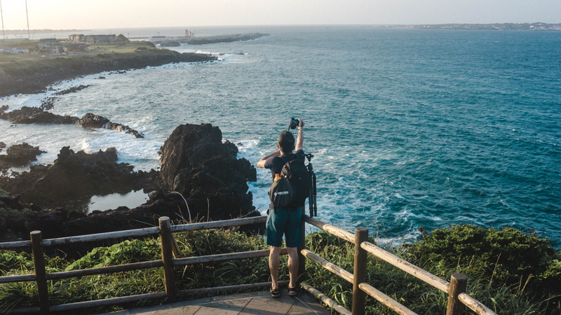 sea, photographer, korea, blue, 5K, scenics - nature, beauty in nature, leisure activity, jeju-do, ocean, looking at view, railing, waves, photographing