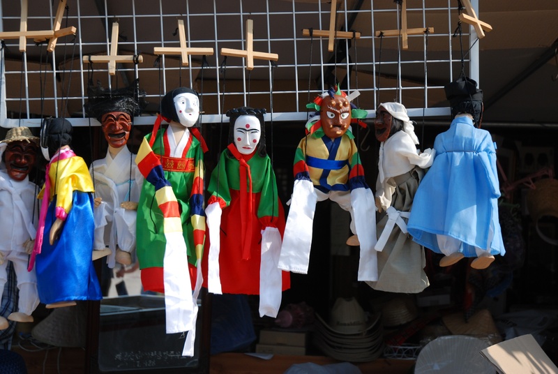 kokeshi, clothing, arts culture and entertainment, puppets, building exterior, celebration, group of people, real people, string, hahoe village, adult