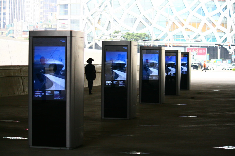 standing, 4K, indoors, real people, dongdaemun design plaza, store, ddp, technology, adult, built structure, transportation, communication, architecture