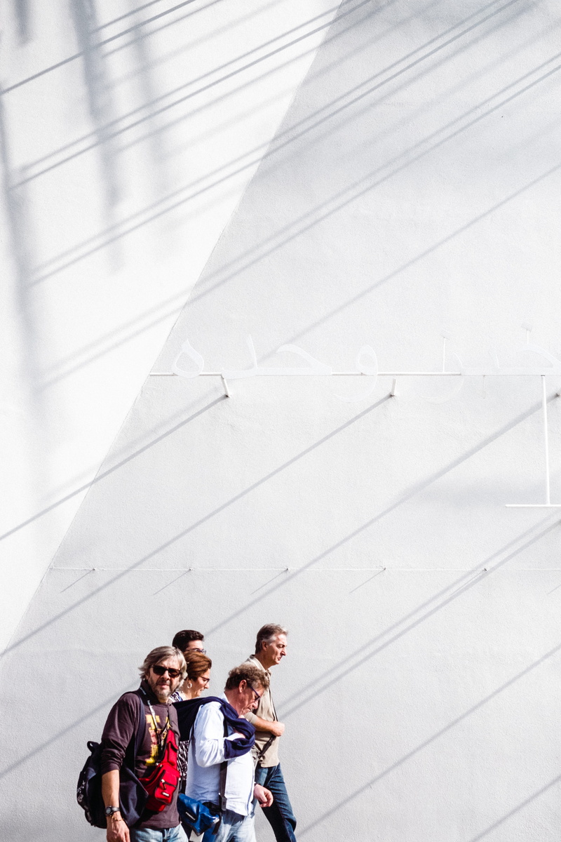 casual clothing, light, arabic, arab, women, streetscape, milan expo 2015, young adult, young men, happiness, real people, emotion, shadow play, switzerland