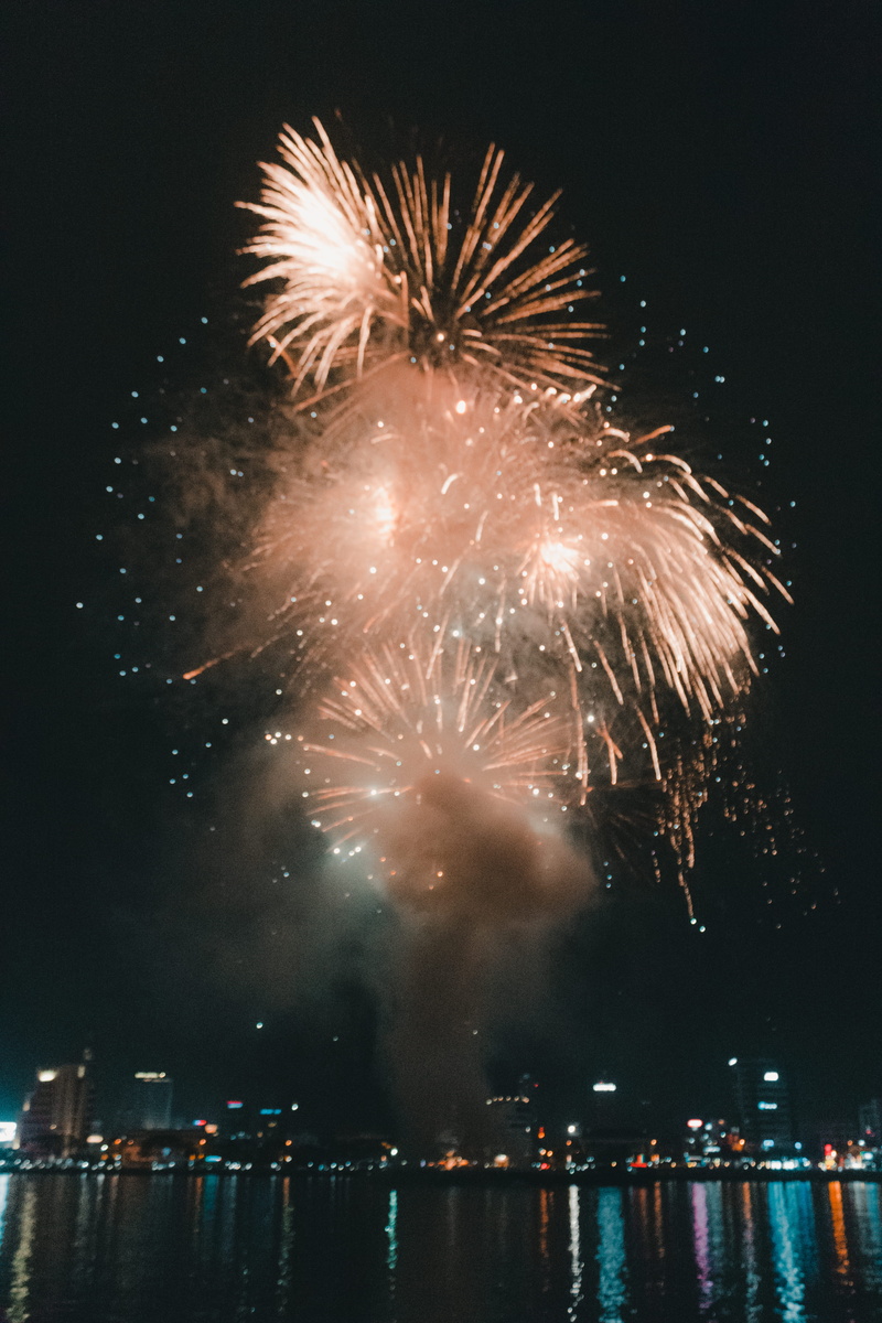 no people, glowing, water, multi colored, city, illuminated, building exterior, celebration, sparks, nature, architecture, exploding, long exposure, vietnam