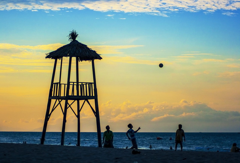 leisure activity, marine, sand, tranquil, group of people, cloud - sky, ball, lifestyles, water, coastal, sunset, person, meteorology, watch, real people