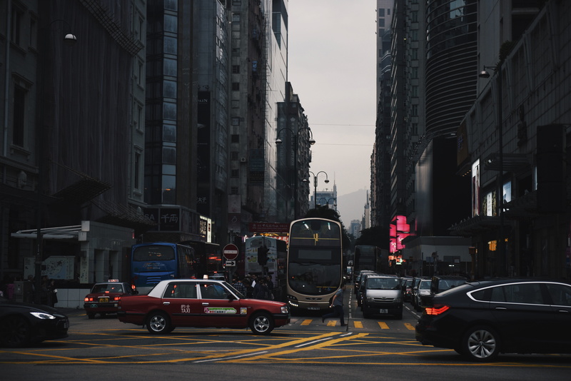 car, 5K, tsim sha tsui, office building exterior, road, traffic, city life, on the move, architecture, incidental people, motor vehicle, building exterior