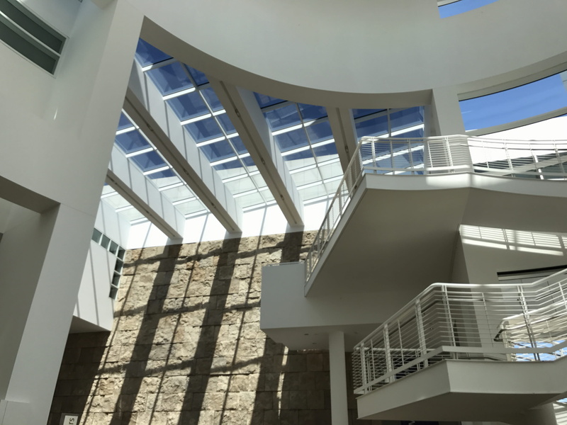 sunlight, california, railing, architecture, indoors, low angle view, building, steps and staircases, staircase, window, glass - material, skylight, day