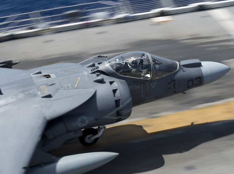 motion, mode of transportation, travel, transportation, flying, USS Bonhomme Richard, deck, military, aircraft, fighter, gray, cockpit, water, no people