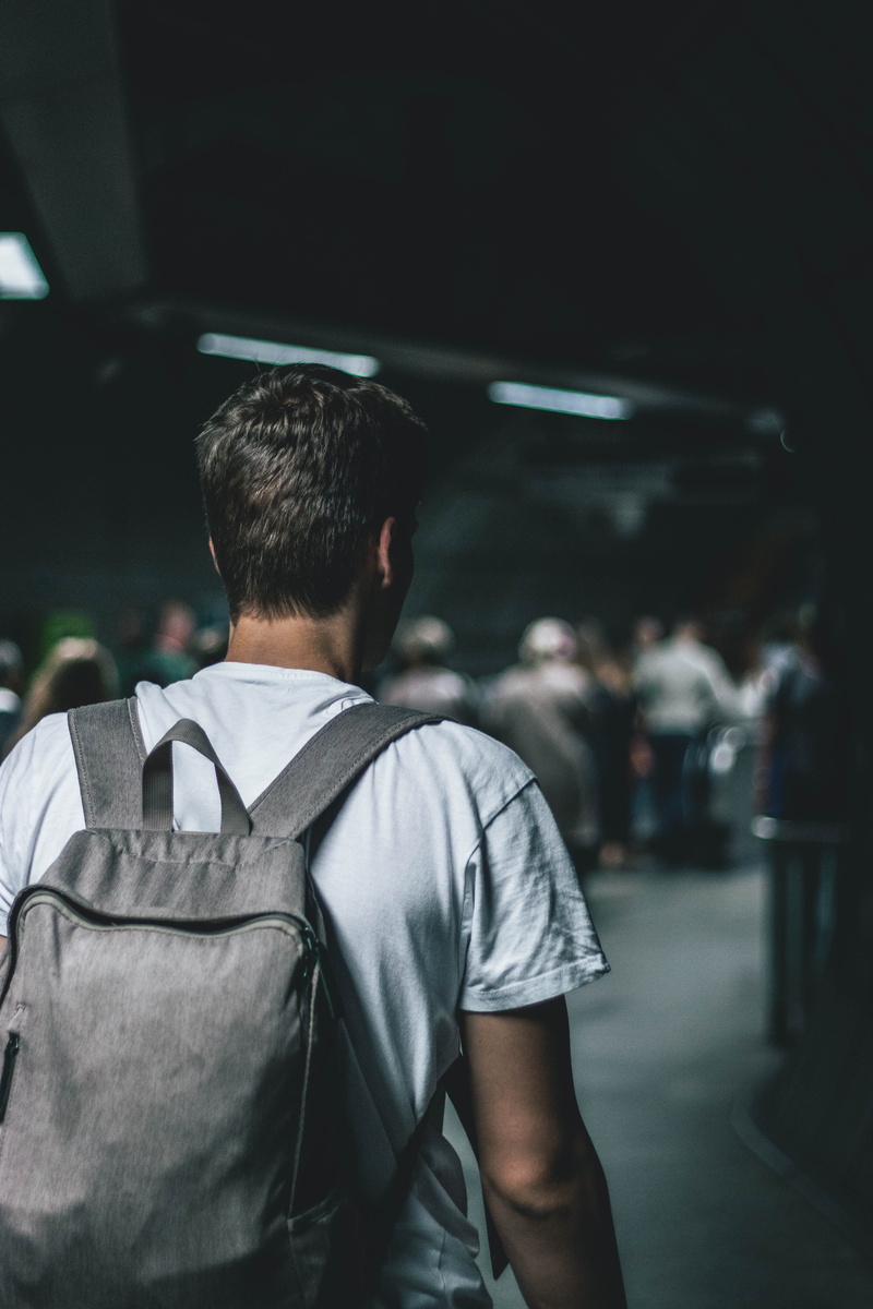 safety, subway, urban, city, guy, casual clothing, backpack, leisure activity, uniform, focus on foreground, transportation, lifestyles, occupation, 5K