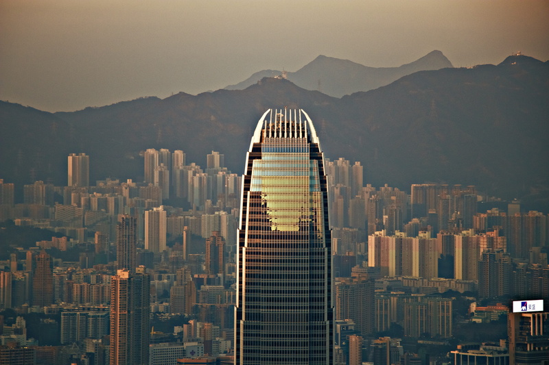 city life, mountain peak, the area of the city, mountain, panoramic, landmark, financial district, outdoors, office building exterior, cityscape, tower