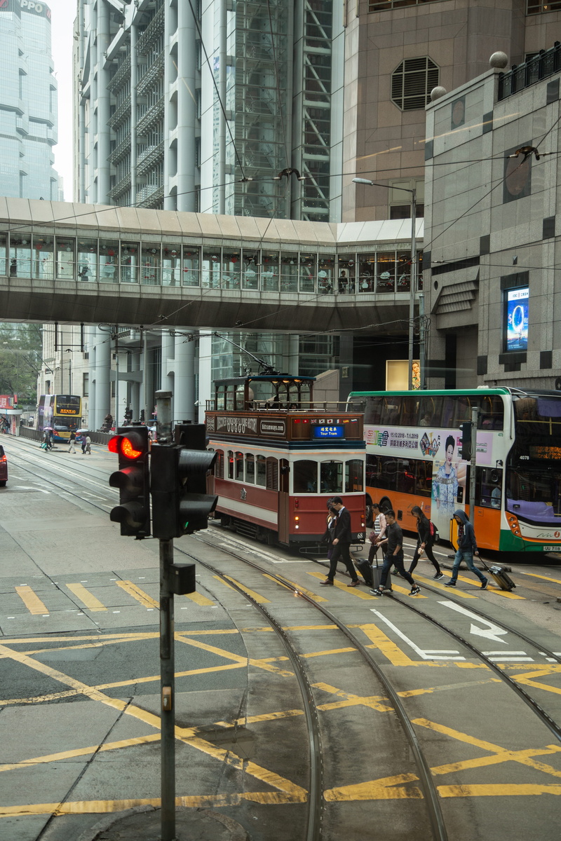 asphalt, street, city, public transportation, real people, person, tarmac, architecture, men, office building exterior, bus, road, rail transportation