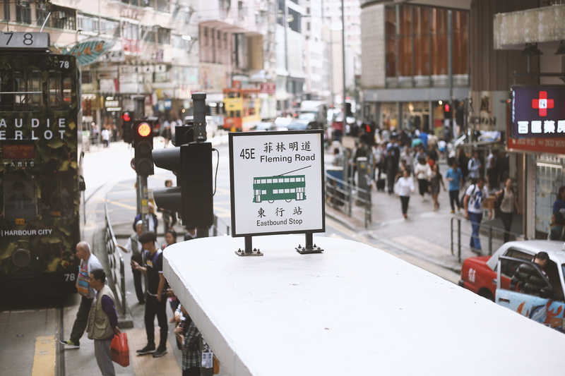 transportation, outdoors, information, city life, incidental people, non-western script, city, real people, crowd, day, sign, architecture, tram, group of people