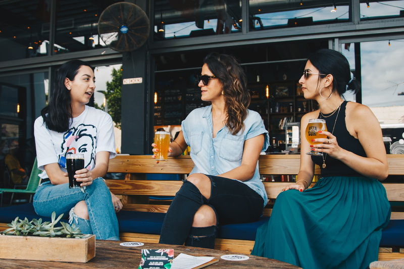 glass, chatting, drink, restaurant, adults, friendship, three, sit, holding, glasses, sitting, table, adult, women, listen, clear, group of people, listening