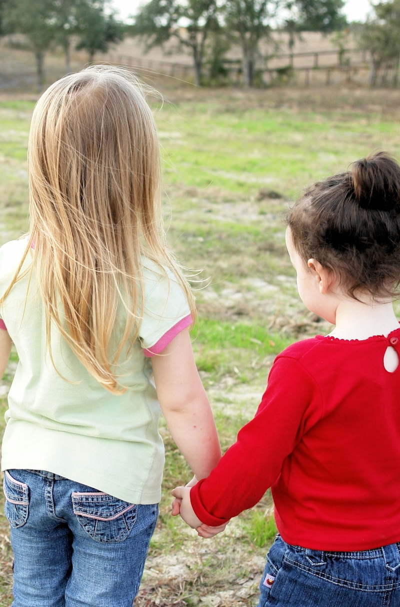 happy, love, trust, children, holding hands, three quarter length, human, positive emotion, females, women, two people, chatting, hairstyle, walking, offspring