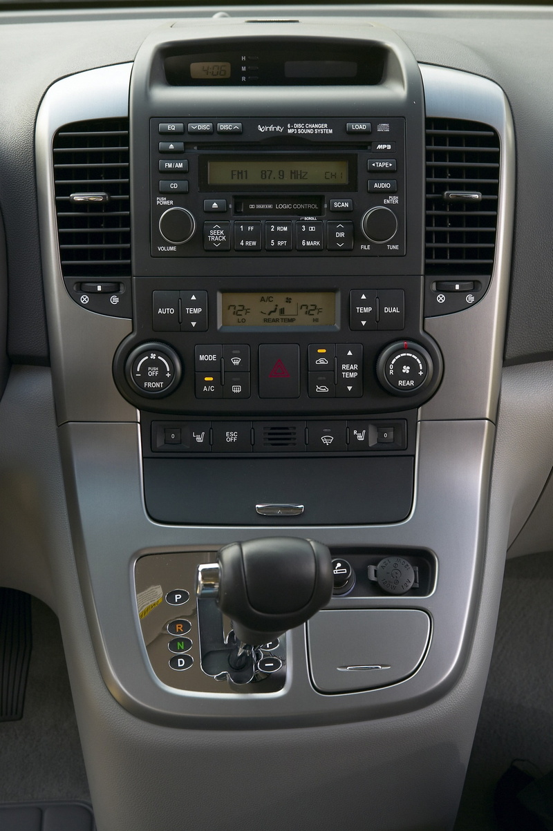 control panel, radio, land vehicle, silver colored, dashboard, modern, 2K, car, air vehicle, keypad, push button, motor vehicle, no people, air conditioner