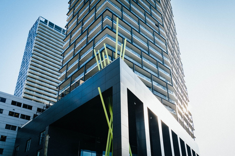 no people, condo, sky, tall - high, artistic, skyscraper, modern architecture, outdoors, low angle view, architecture, pipes, property management, toronto